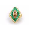 Image 1 : A Fancy Orange-Brown Diamond and Emerald Ring