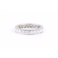 A Platinum Diamond Wedding Band, by Tiffany & Co.