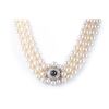 Image 1 : A Three Strand Cultured Pearl and Diamond Necklace