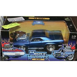 NEW DIE CAST "MUSCLE MACHINES"   '66 GTO
