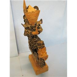 Figurine made from foreign coins