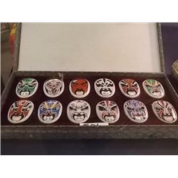 ORNAMENTAL ASIAN CERAMIC MASKS IN DISPLAY CASE - E