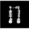 Image 2 : 0.15 ctw Diamond and Pearl Earrings - 14KT White Gold