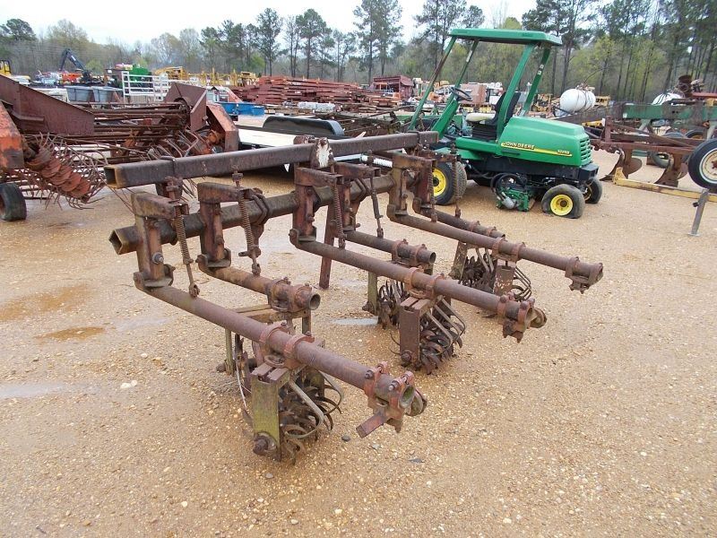 2 ROW ROLLING CULTIVATOR J.M. Wood Auction Company, Inc.