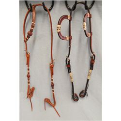 Headstalls (2) - single ear with rawhide and double ear with rawhide