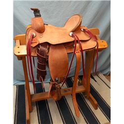 Morris Saddlery, 12", junior association, double rig, rough out, rawhide wrapped cantle & horn, bran