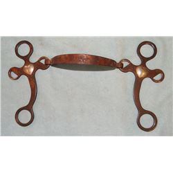 Early day iron hackamore with silver hearts