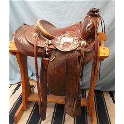 Stock saddle, 13", cast iron tree, rawhide bound cantle