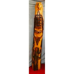 Tall bear totem pole