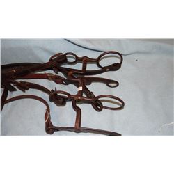 2 vintage iron bits in headstalls