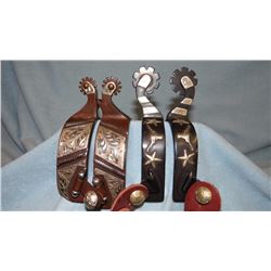 2 pair new fancy spurs