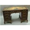 Image 1 : An Edwardian Maple & Co mahogany pedestal desk, of serpentine rectangular form, with nine foliate...