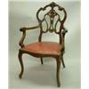Image 1 : An Edwardian walnut elbow chair, with foliate scroll carved frame and cabriole legs...