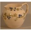 A Moorcroft for Liberty bulbous jug, decorated with fruiting vines on a white ground, W Moorcroft...
