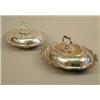 Image 1 : A pair of George V silver entree dishes and covers, of serpentine oval form with detachable handl...