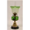 Image 1 : A Victorian Oil Lamp, with an etched glass shade, a green glass reservoir, on a brass column, 57...
