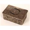 Image 1 : A 19th Century Bird Music Box, decorated villages scenes in relief, in a silver coloured metal ca...