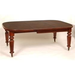 A Victorian Mahogany Extending Dining Table, on turned and reeded legs, 183 cm  See illustration...