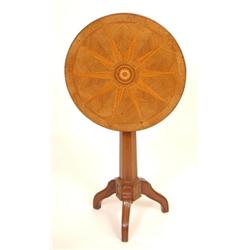 A French Inlaid Tripod Table, the top decorated a star, on a hexagonal column  See illustration £...