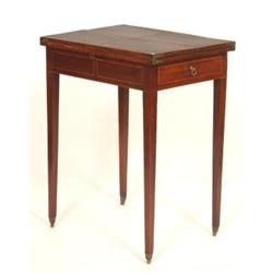 A 19th Century Mahogany Writing Table, the fold over top above a single frieze drawer, on square...