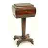 Image 1 : A William IV Rosewood Teapoy, with gadrooned edging, with a fitted interior, on an octagonal colu...
