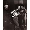 Image 1 : WEEGEE (ARTHUR FELLIG) (American, b. Poland, 1899-1968) RIOT ARREST 2 different artist’s stamps o...