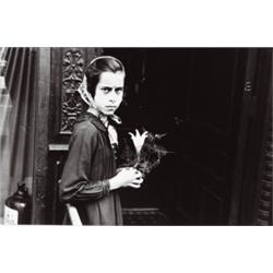 HELEN LEVITT (American, b. 1918) NEW YORK CITY (GIRL WITH LILY) titled, dated and signed in penci...