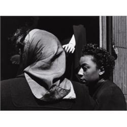 ROY DECARAVA (American, b. 1919) TWO WOMEN, MANNEQUIN’S HAND signed, “ROY DECARAVA” in pencil bel...