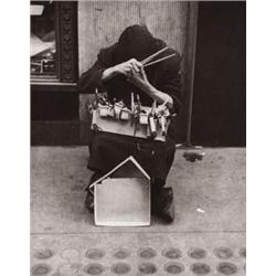 LOUIS FAURER (American, 1916-2001) STREET PEDDLER signed and dated “Louis Faurer 1952” in pencil ...