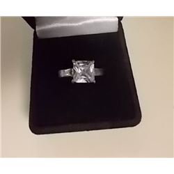 RING - LARGE CLEAR STONE - NON FEROUS