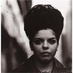 DIANE ARBUS (American, 1923-1971) GIRL WITH A BEEHIVE HAIRDO, N.Y.C. Estate of Diane Arbus copyri...