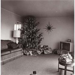 DIANE ARBUS (American, 1923-1971) XMAS TREE IN A LIVING ROOM IN LEVITTOWN, L.I. Estate of Diane A...
