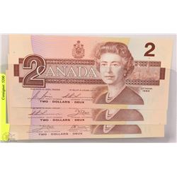 THREE 1986 CANADIAN $2 UNCIRCULATED BILLS