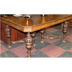 SOLID WALNUT CARVED DININGROOM TABLE