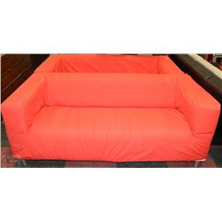 TWO ORANGE FABRIC LOVESEATS