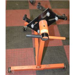 BLACK AND ORANGE ENGINE STAND