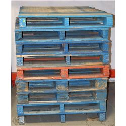 STACK OF 9 HEAVY DUTY SOLID WOOD PALLETS