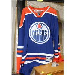 GENUINE OILERS JERSEY SIZE LARGE NEW WITH TAGS