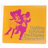 Image 1 : "Getting to Know the Disney Characters" Walk-Around Character Guide Book.