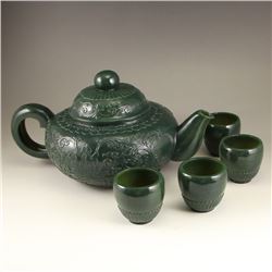 A Set Chinese Qing Dynasty Deep Green Hetian Jade Low Relief Teapot & Cups