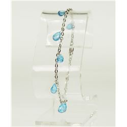 #43-10KT GOLD BLUE TOPAZ BRACELET