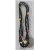 Image 1 : BEADED NECKLACE WITH US 1$ COIN PENDANT
