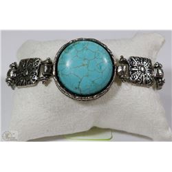 SILVER TONE BAND WITH LARGE TURQUOISE STONE 8"