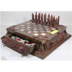 CHESS BOARD WITH CARVED FIGURINES FROM MEXICO