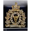 Image 1 : NEW  "ROYAL CANADIAN MOUNTED POLICE" CAP BADGE