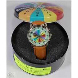 NEW 1999 WHEEL OF FORTUNE WATCH -SPINNING WHEEL &