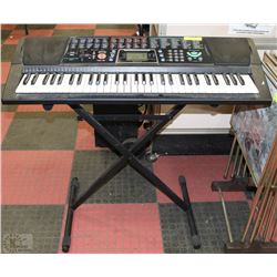 BATTERY OPERATED CONCERTMATE 980 PIANO W/STAND