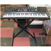 Image 1 : BATTERY OPERATED CONCERTMATE 980 PIANO W/STAND