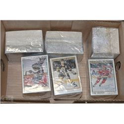 900 ASSORTED SPORTS CARDS