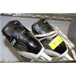 PAIR OF CHILDRENS CCM HOCKEY SKATES SIZE UNKNOWN